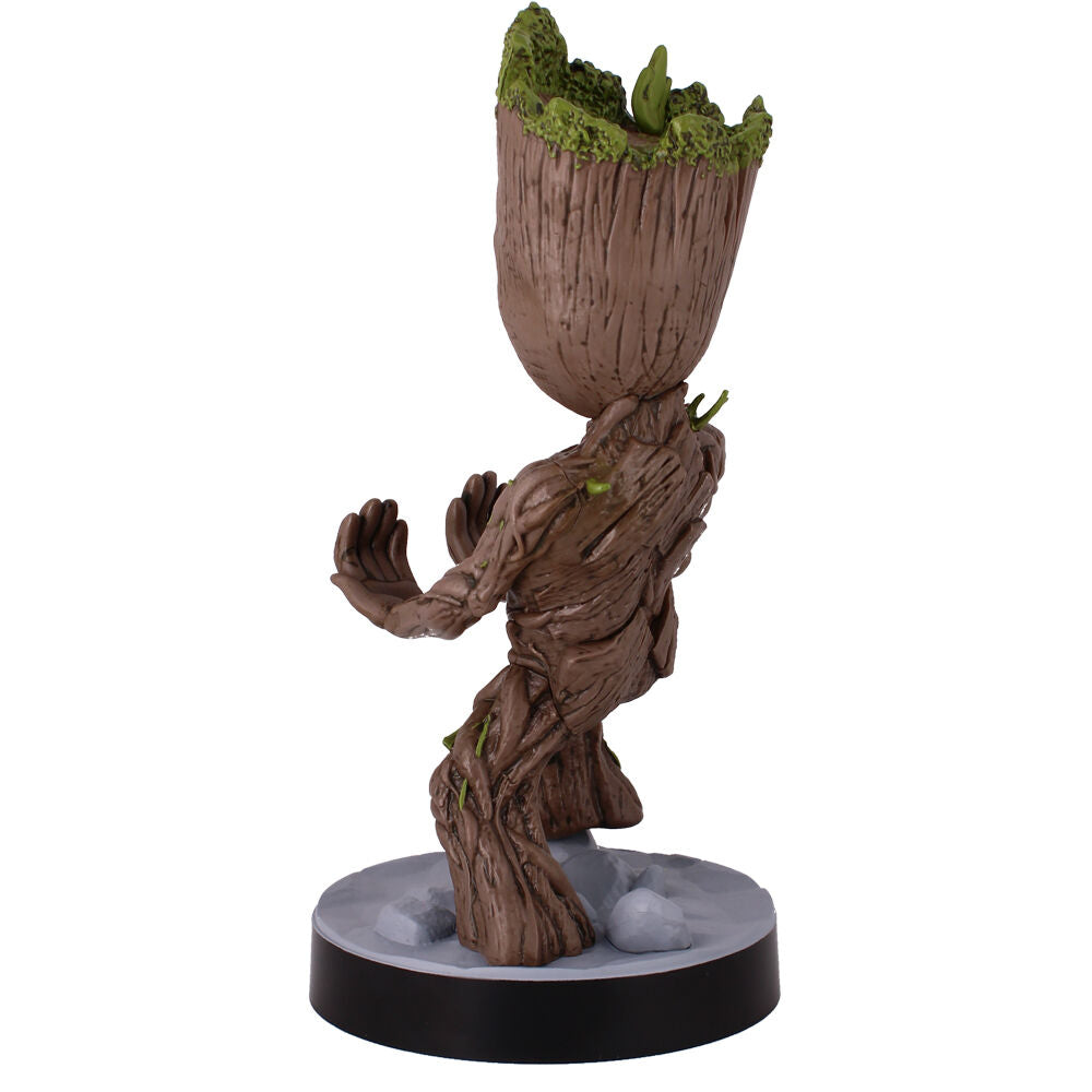 Support Groot avec une manette Xbox Series S/X posée dessus dans un environnement gaming