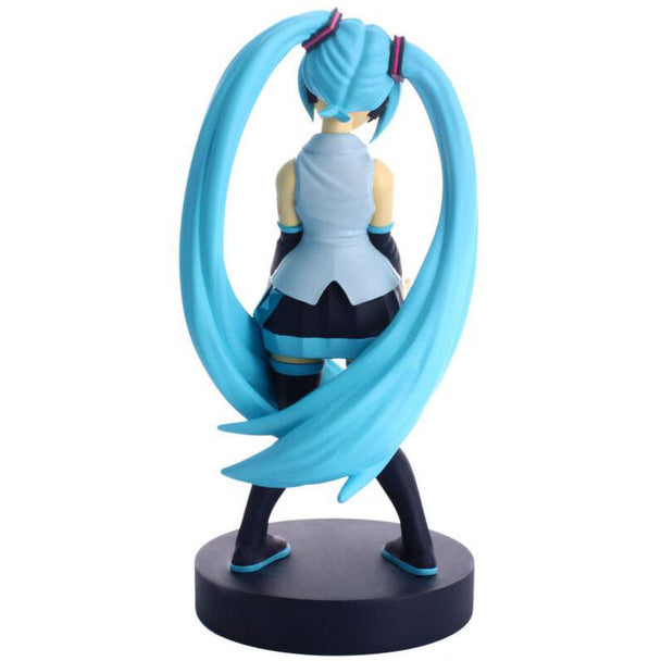 Support Cable Guy Hatsune Miku avec une manette PlayStation 5 DualSense posée dessus