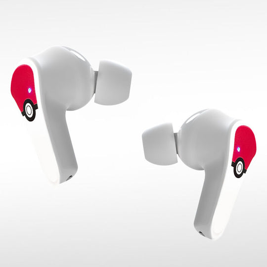 Présentation des écouteurs Pokémon Pokeball posés à côté de la boîte de vente montrant le packaging complet