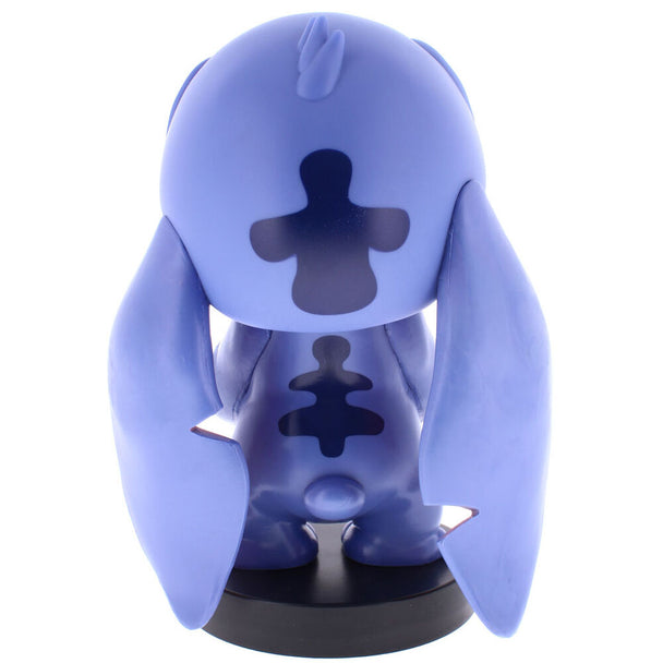 Vue de face du support Disney Stitch avec une manette Xbox Series X et un smartphone posé dessus