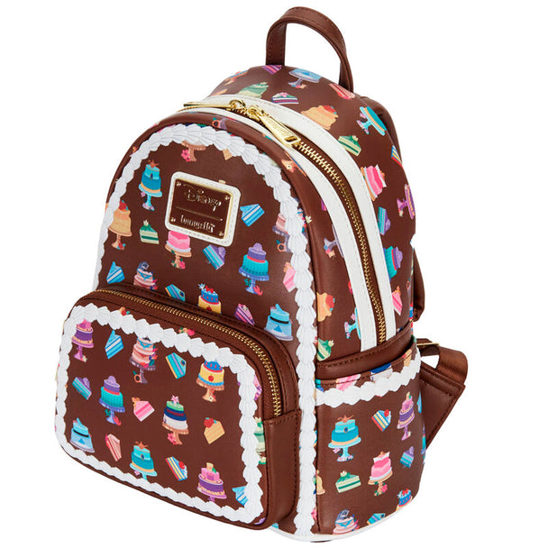 Zoom sur le détail des gâteaux colorés représentant les Princesses Disney sur le sac à dos
