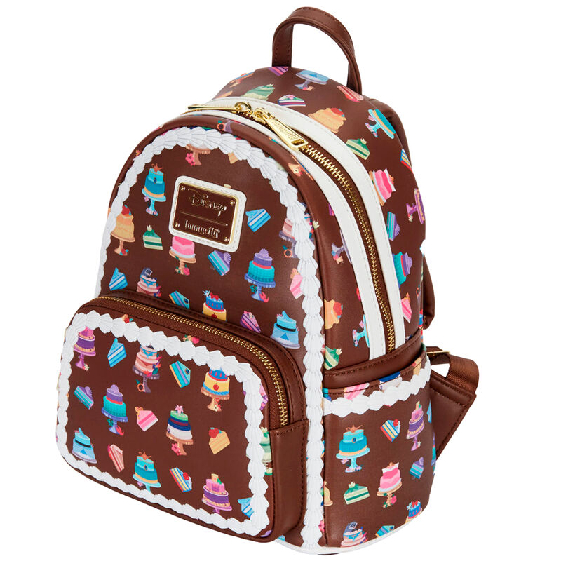 Zoom sur le détail des gâteaux colorés représentant les Princesses Disney sur le sac à dos