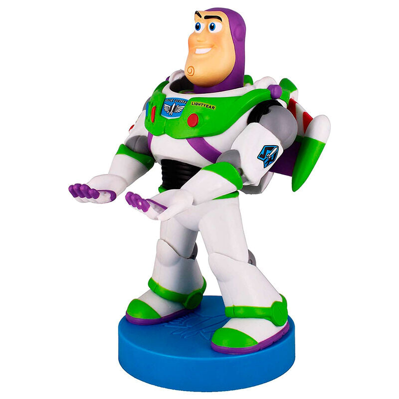 Vue d'ensemble du support Buzz Lightyear posé sur un bureau de gamer avec accessoires.
