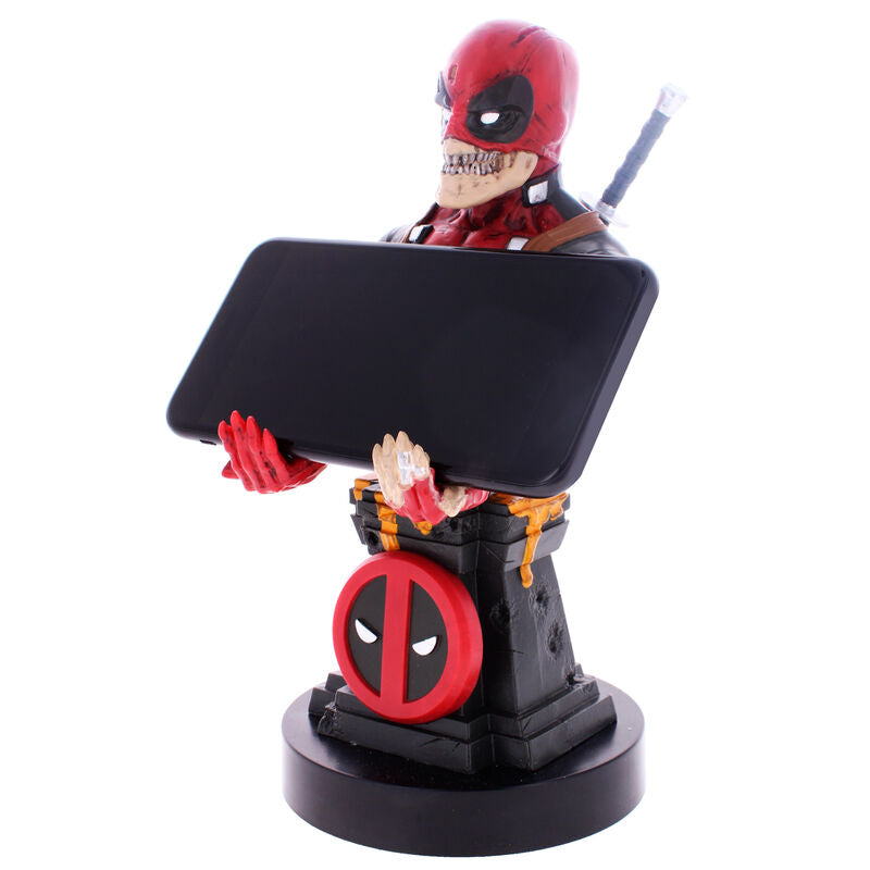 Support câble Marvel Deadpool Zombie avec smartphone iPhone posé à côté