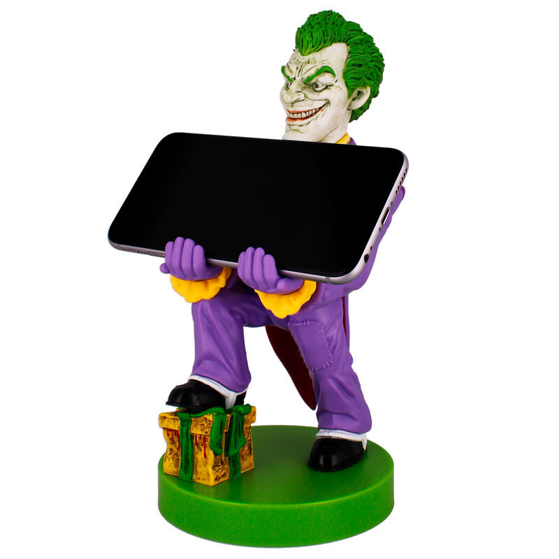 Photo du support Cable Guy Joker avec manette et câble de recharge branché (câble non inclus)