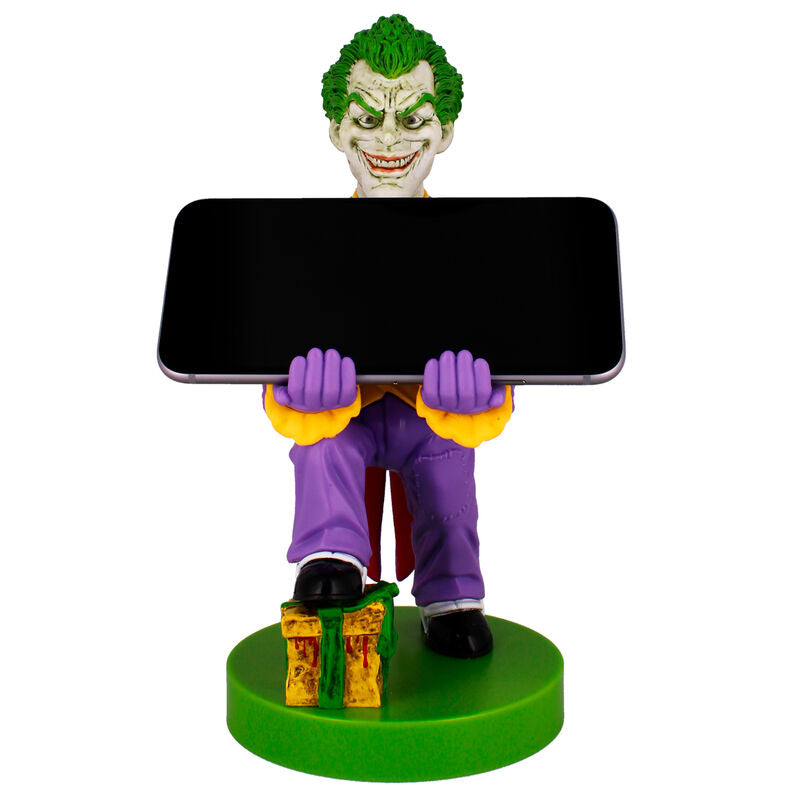 Présentation du support Cable Guy Joker DC Comics sur un bureau de gaming moderne