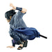 Figurine Naruto Shippuden Sasuke Uchiha posée sur socle, vue arrière