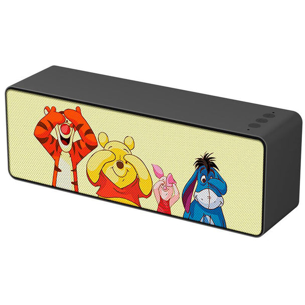 Enceinte portable sans fil Disney Winnie l'Ourson avec design coloré et compact, idéale pour écouter de la musique partout