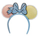 Serre-tête Loungefly Minnie Mouse pastel avec oreilles et nœud à pois vu de face sur fond blanc