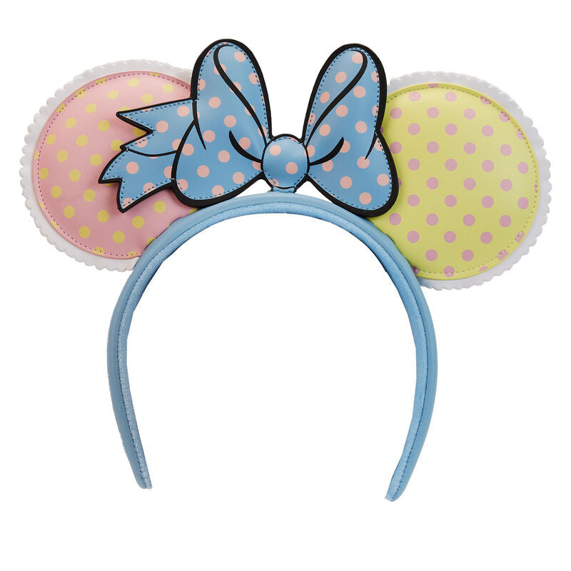 Serre-tête Loungefly Minnie Mouse pastel avec oreilles et nœud à pois vu de face sur fond blanc