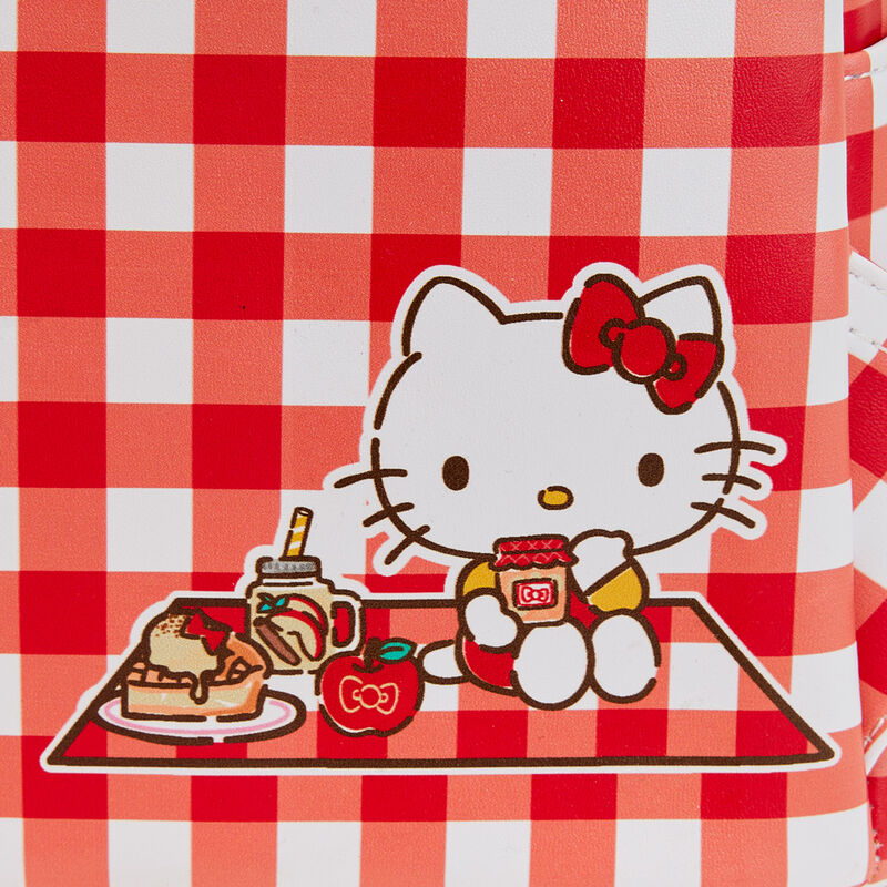 Vue latérale du sac à dos Loungefly Hello Kitty Sanrio mettant en avant la profondeur et les poches latérales