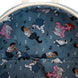 Photo du sac à dos Loungefly Disney La Petite Sirène Max posé sur une surface neutre