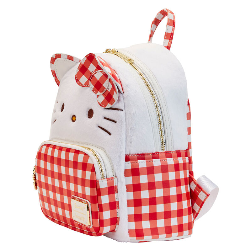 Sac à dos Loungefly Hello Kitty Sanrio posé sur une surface blanche, illustrant son design compact et élégant