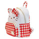 Sac à dos Loungefly Hello Kitty Sanrio posé sur une surface blanche, illustrant son design compact et élégant
