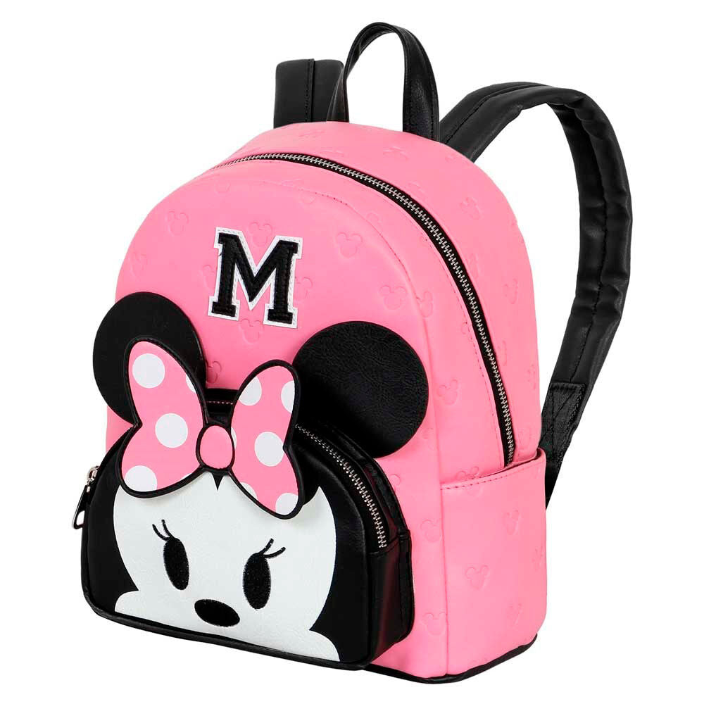 Vue latérale du sac à dos Minnie Heady mettant en valeur sa capacité et ses finitions soignées.