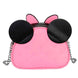 Photo du sac à dos Disney Minnie Heady porté sur l'épaule, illustrant sa taille compacte