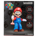 Figurine Super Mario Bros en situation de jeu sur un bureau décoré