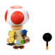 Vue latérale droite de la figurine Toad mettant en avant les couleurs vives et la texture