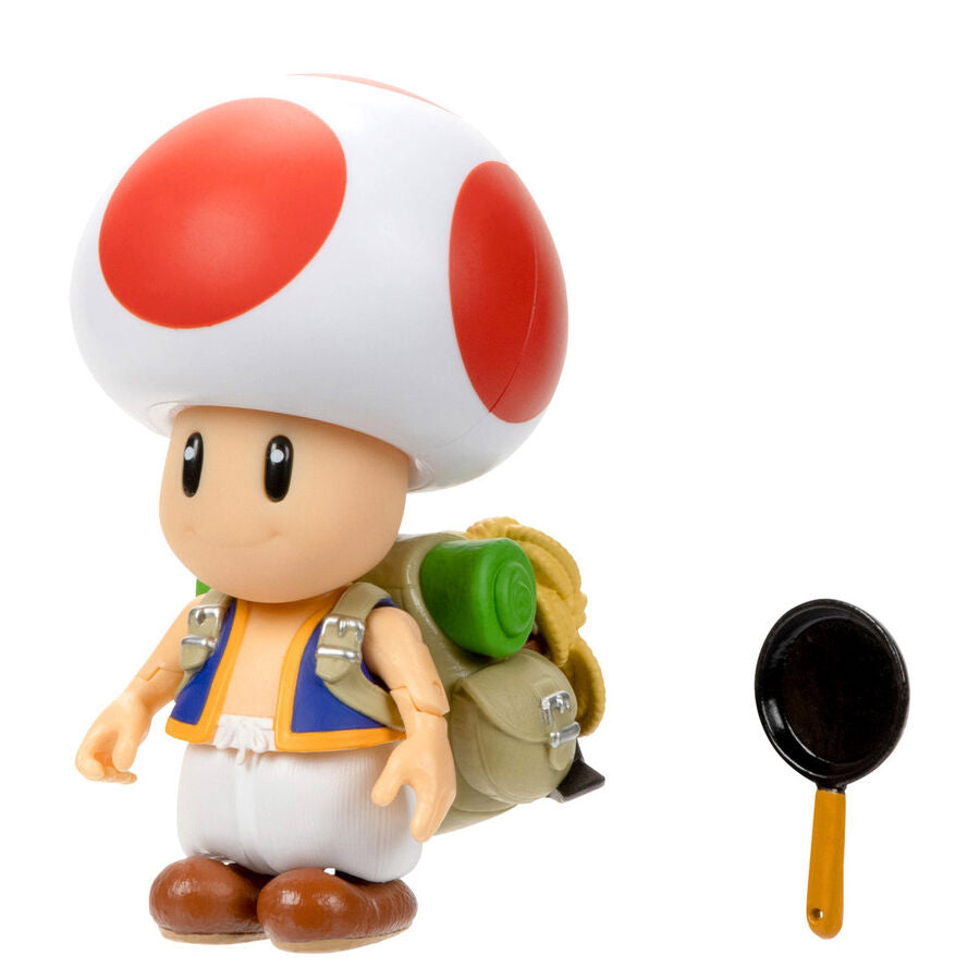 Gros plan sur le visage souriant de la figurine Toad Super Mario Bros