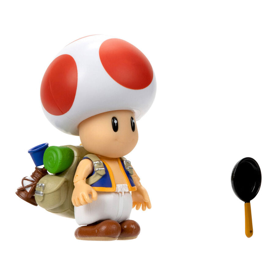Photo de la figurine Toad posée sur une surface blanche, éclairage naturel