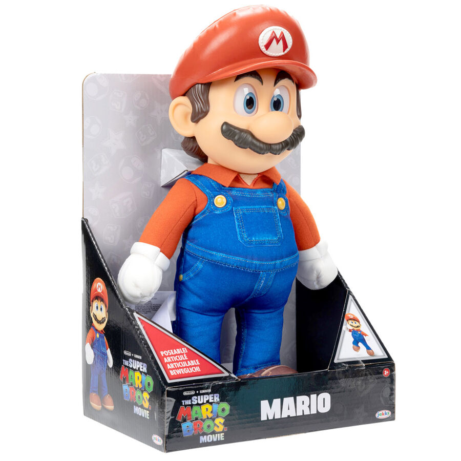 Peluche Super Mario Bros tenue par une main pour montrer son échelle et sa douceur