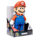Peluche Super Mario Bros tenue par une main pour montrer son échelle et sa douceur