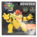 Gros plan sur la tête de Bowser avec expression menaçante et effet feu