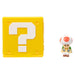 Figurine Toad avec chapeau blanc à pois rouges et sourire accueillant