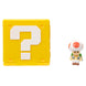 Figurine Toad avec chapeau blanc à pois rouges et sourire accueillant