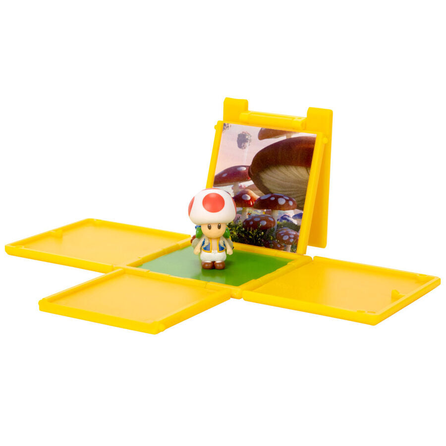 Figurine Wario avec costume jaune et violet, expression malicieuse