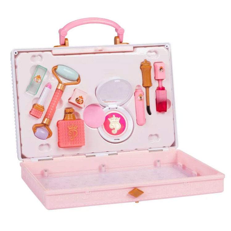 Miroir compact et accessoires de maquillage Disney Princesses disposés soigneusement dans la trousse de voyage