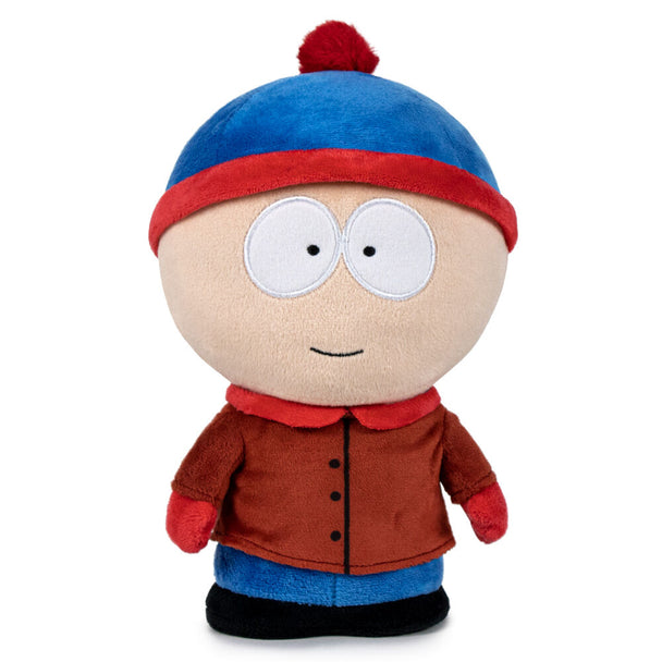 Peluche Stan de South Park officielle de 27 cm, fabriquée par Paramount Pictures, montrant le personnage avec son bonnet bleu et rouge distinctif.