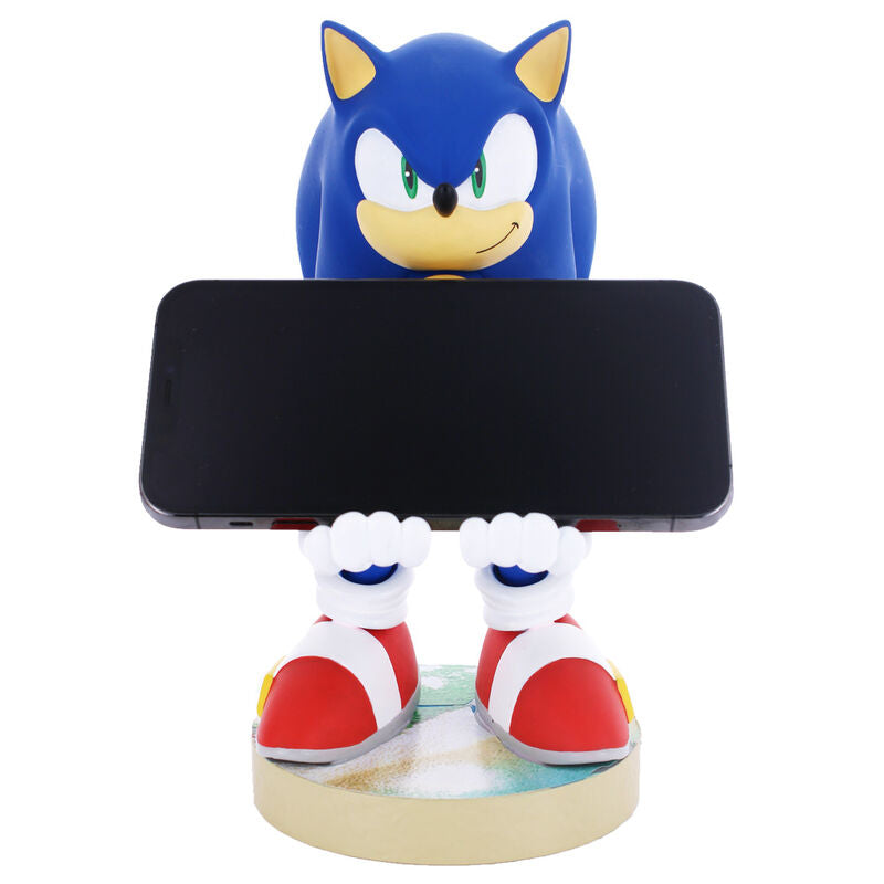 Vue latérale du support Sonic avec câble de charge branché sur une manette Xbox