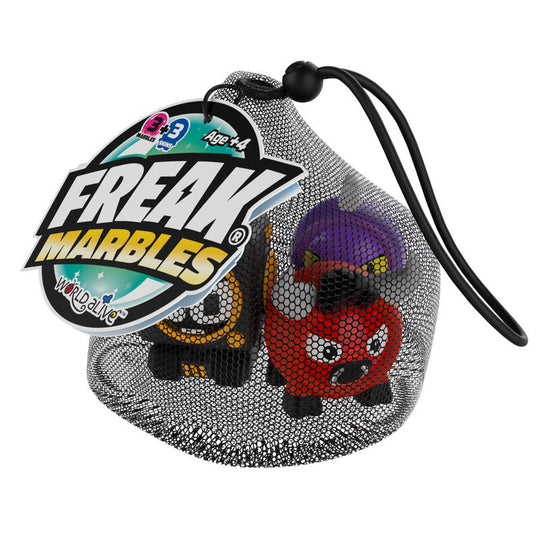 Set de 3 billes Freak Marbles colorées posées sur fond blanc, diamètre 4 cm