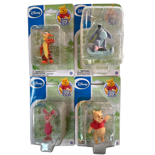 Figurine Disney Winnie l'Ourson de 6cm avec détails colorés et design officiel.