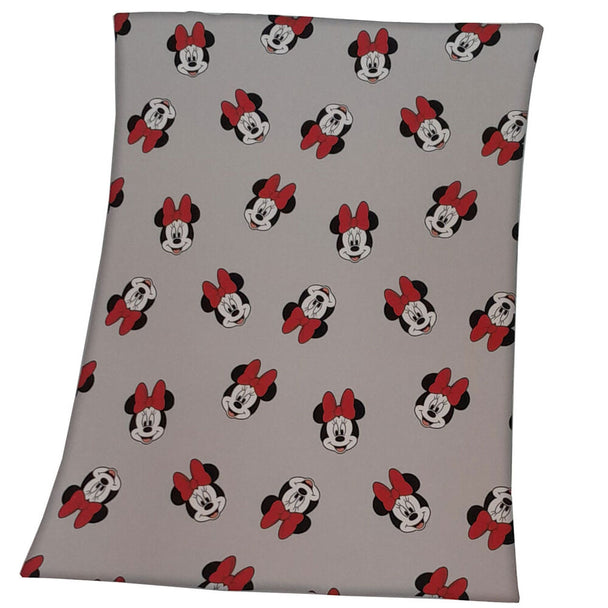 Couverture Disney Minnie de 100x75cm, douce et colorée, parfaite pour enfants.