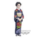 Vue arrière de la figurine Tamayo mettant en valeur les détails du costume