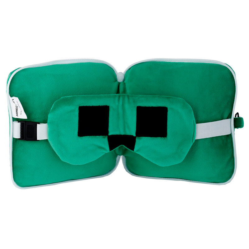 Vue rapprochée de la texture douce en polyester et spandex de l’oreiller de voyage Minecraft Creeper