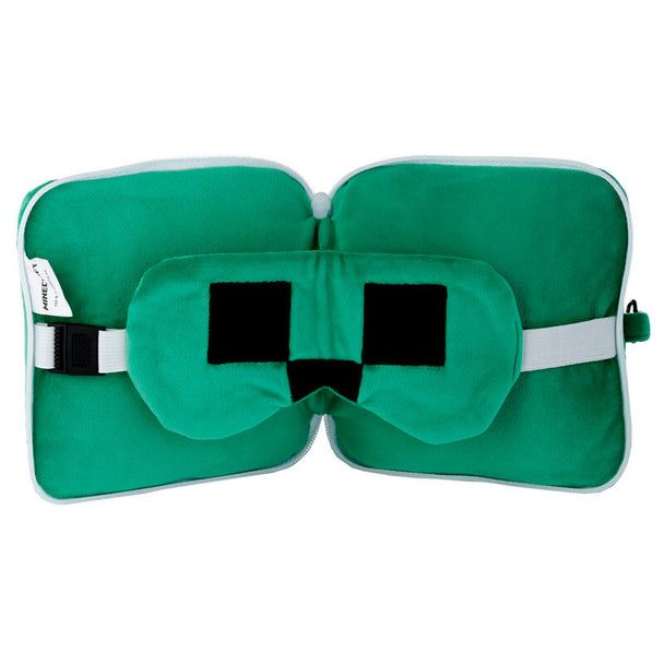 Vue rapprochée de la texture douce en polyester et spandex de l’oreiller de voyage Minecraft Creeper