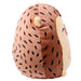 Coussin hérisson Mitzi Adoramals PUCKATOR posé sur un canapé, ambiance cosy et décorative