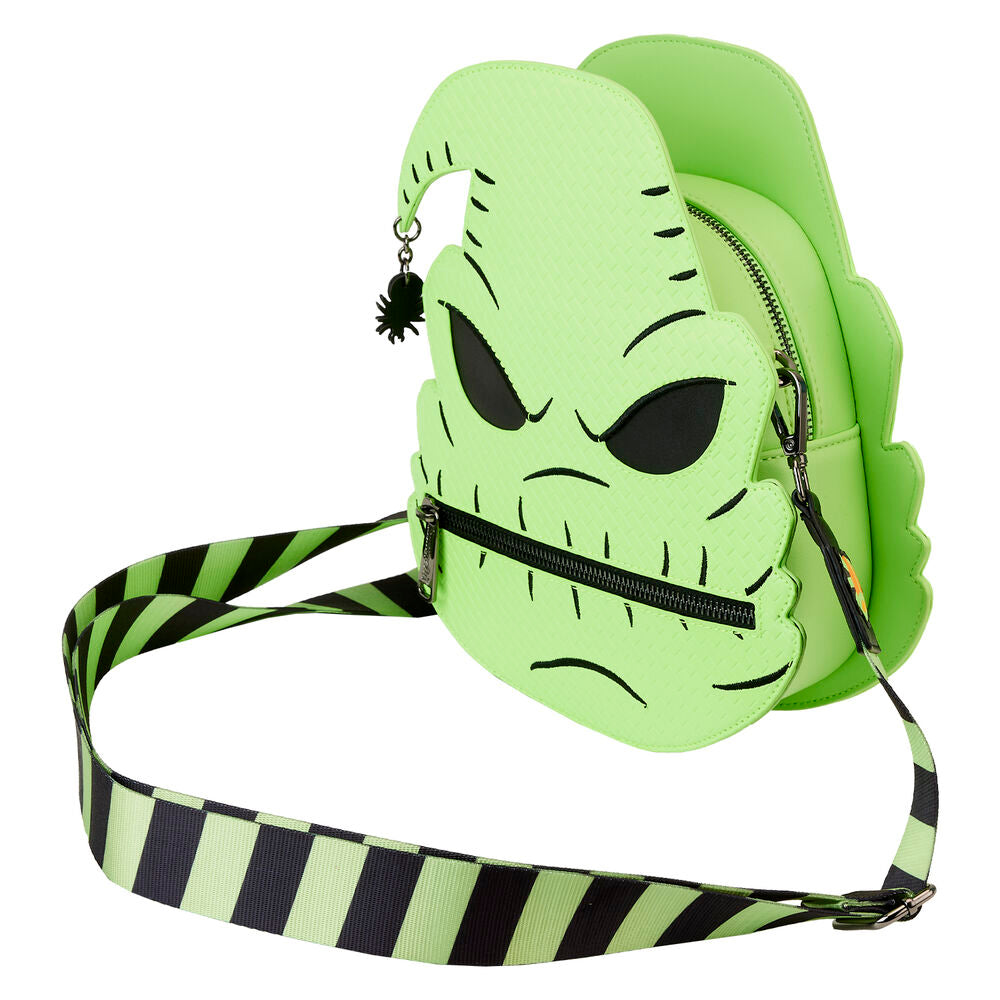 Détail des motifs phosphorescents et imprimés sur le sac Oogie Boogie visible dans l'obscurité