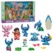 Set complet de figurines Stitch 6cm alignées sur fond blanc, montrant différentes poses