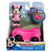 Vue latérale de la figurine Minnie Mouse en position debout avec ses mains levées