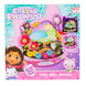 Enfant jouant avec le set de jardinage Gabbys Dolls House dans un environnement ludique