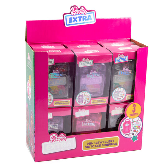 Mini valise Barbie rose ouverte avec accessoires assortis visibles à l'intérieur