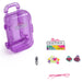 Mini valise Barbie tenue dans la main d'un enfant montrant sa taille compacte