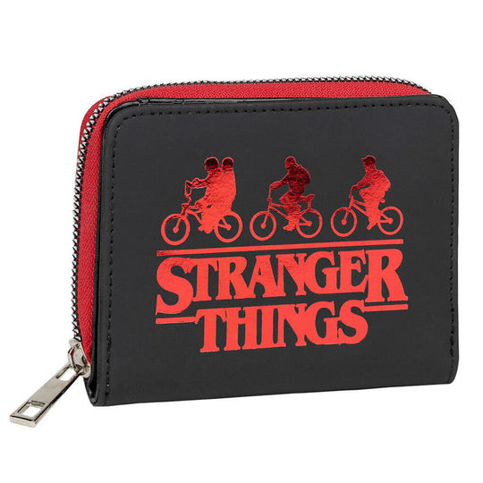 Portefeuille Stranger Things posé sur une surface, mettant en avant sa taille compacte.