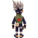 Gros plan sur le visage de Kakashi Minix avec son œil Sharingan distinctif et expression concentrée