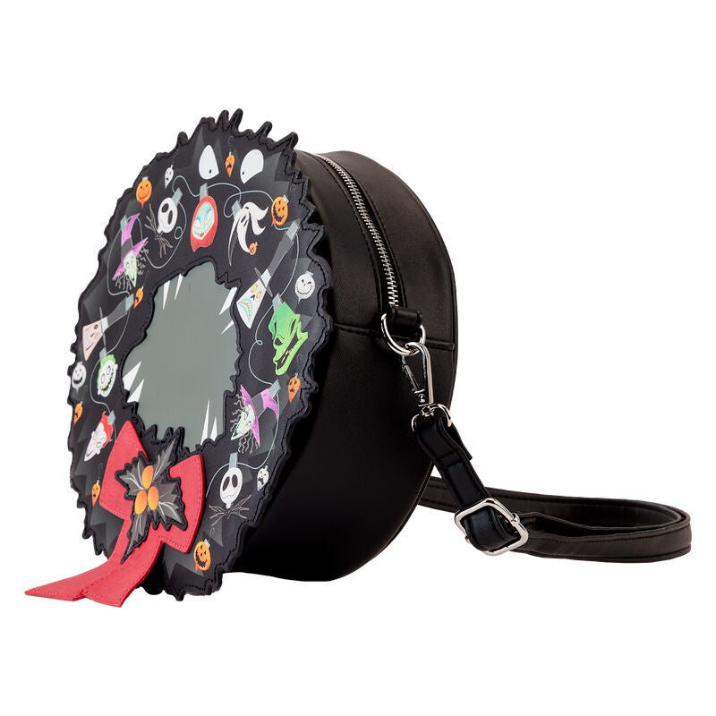 Intérieur du sac Loungefly Nightmare Before Christmas montrant la doublure coordonnée et l'espace de rangement pratique