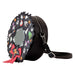 Intérieur du sac Loungefly Nightmare Before Christmas montrant la doublure coordonnée et l'espace de rangement pratique